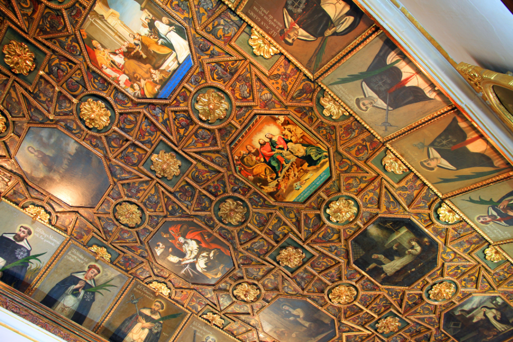 Wonderful paintings adorn the ceiling of Santo Domingo Church in Quito, Ecuador