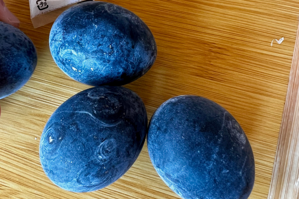 Black eggs cooked in volcanic steam. This is meant to give you 7 more years of life if you eat one.
