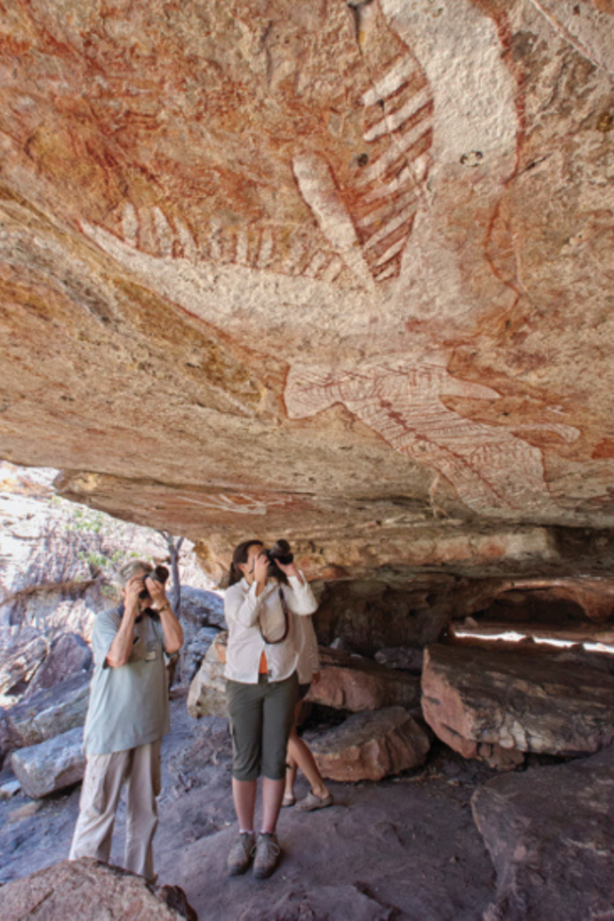 6,000-year-old Rainbow Serpent rock art. - Virtuoso Travel Ewen Bell